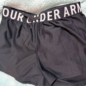 Under Armour Girl’s performance black shorts with white logo waistband
